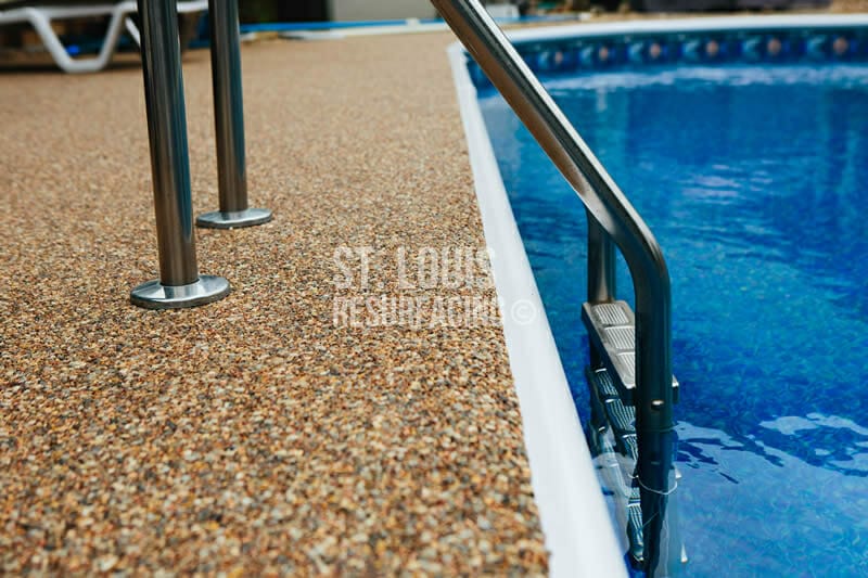 epoxy-stone pool deck in st. louis, missouri. pebble-stone epoxy pool deck in stl, mo.